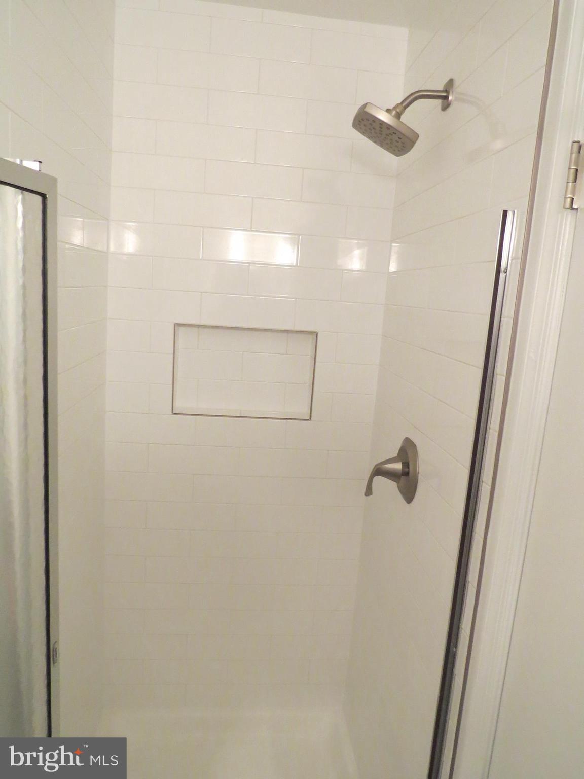 7730 Merrick Lane Landover, MD 20785 - Photo 3 of 19 a bathroom with a shower