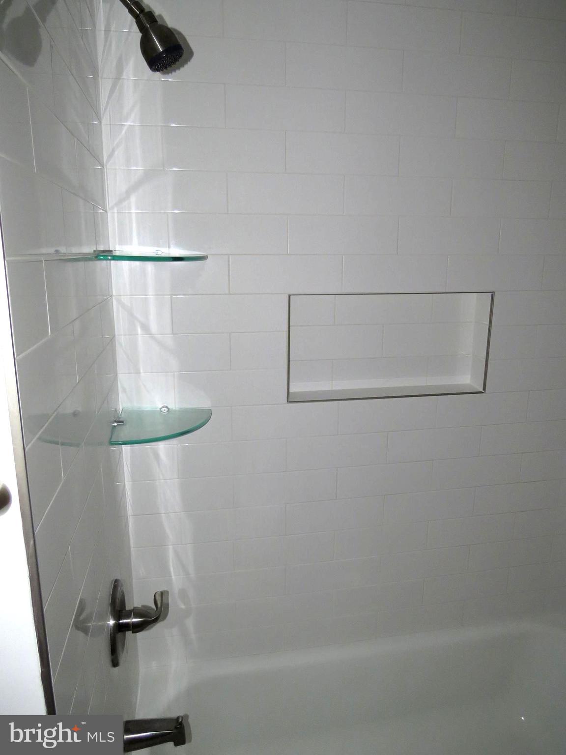 7730 Merrick Lane Landover, MD 20785 - Photo 5 of 19 a bathroom with a shower