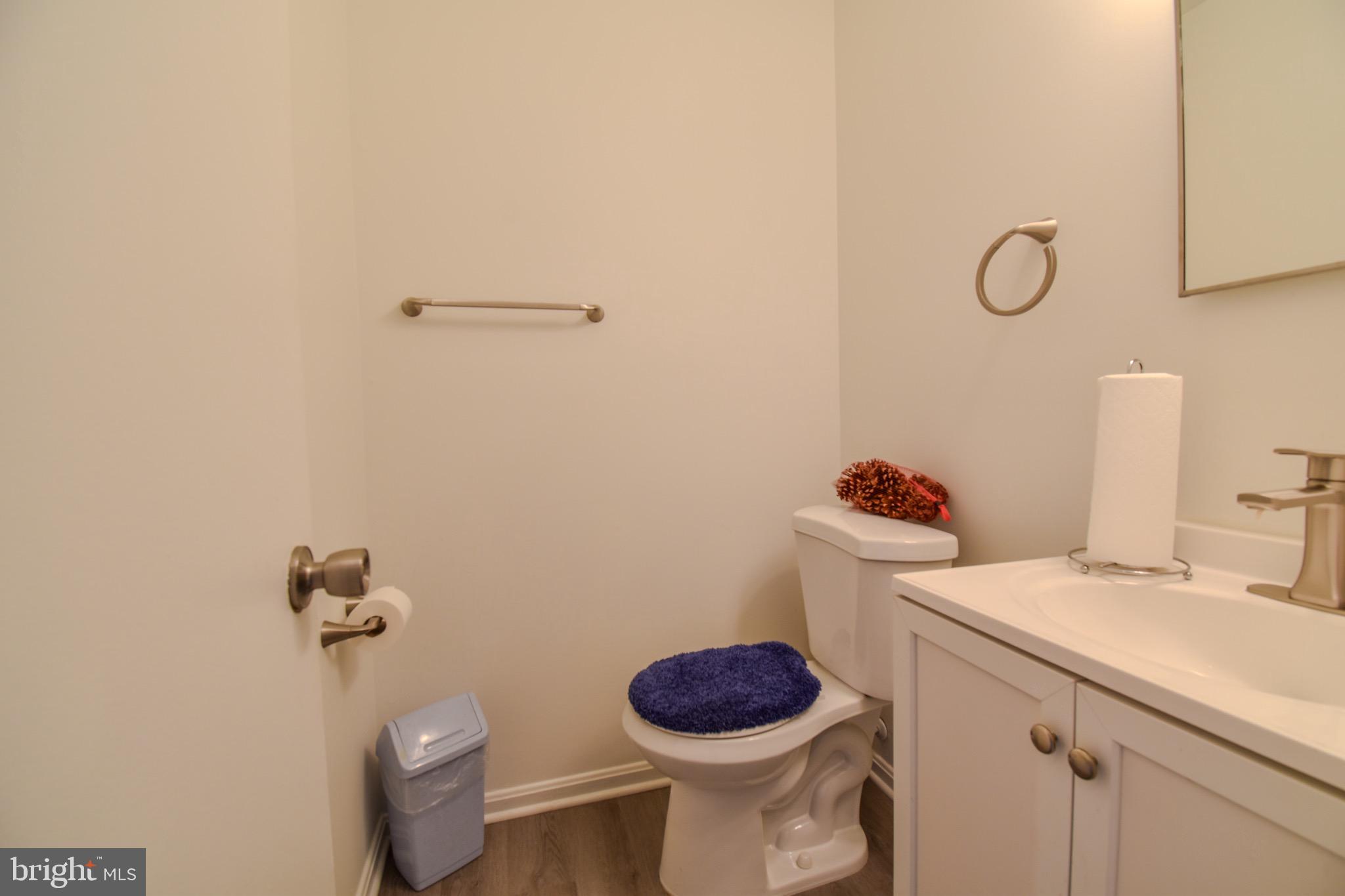 7730 Merrick Lane Landover, MD 20785 - Photo 9 of 19 a bathroom with a toilet and a sink