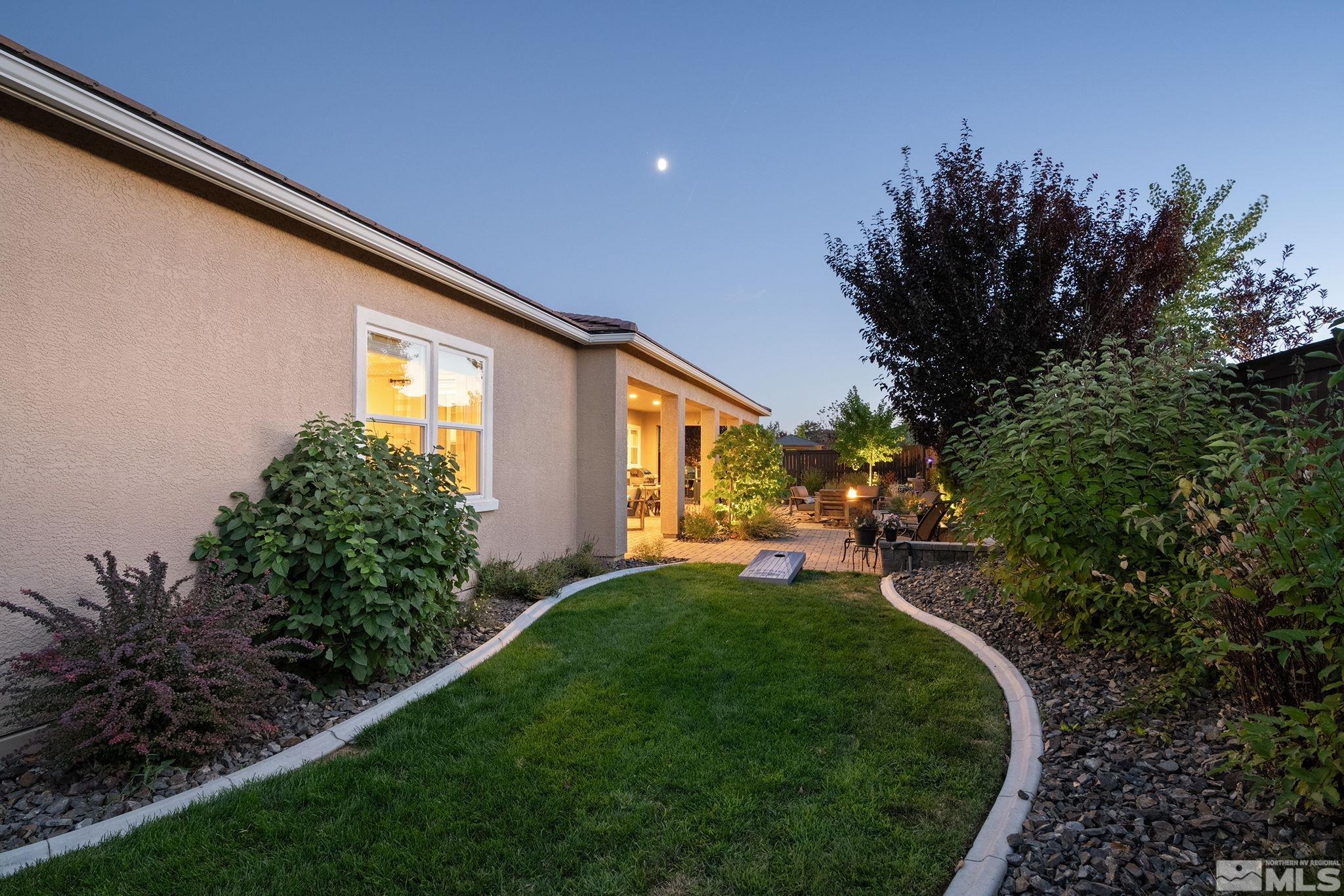 9865 Sea Breeze Lane Reno, NV 89521 - Photo 36 of 36 a view of a house with backyard and sitting area