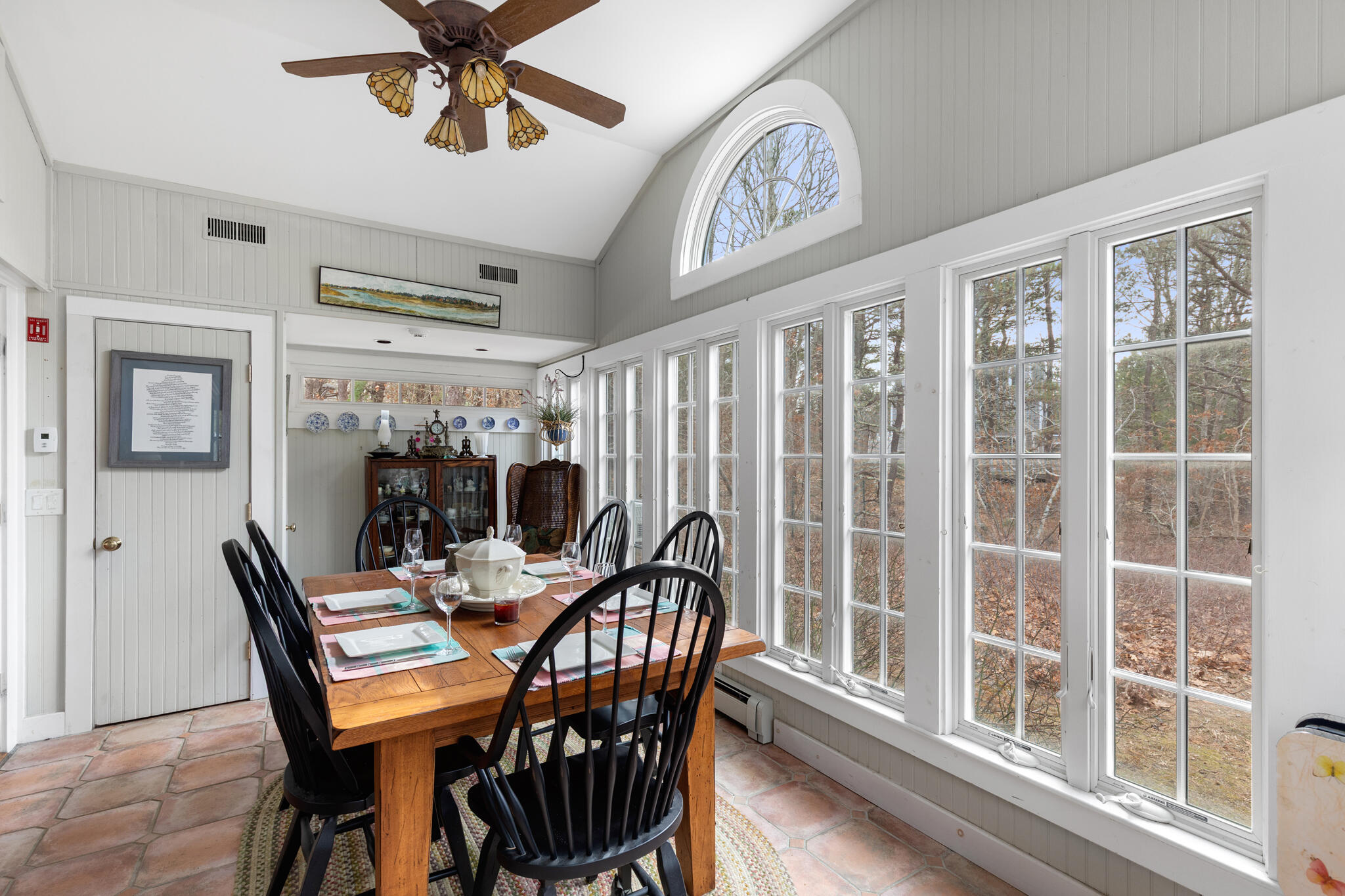 311 South Sunken Meadow Road Eastham, MA 02642 - Photo 21 of 57 a view of a dining room with furniture window and wooden floor