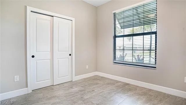 an empty room with windows