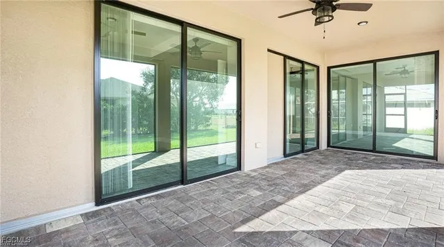 a view of a room with a large window