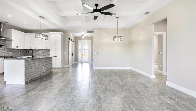 a view of a kitchen and a stove