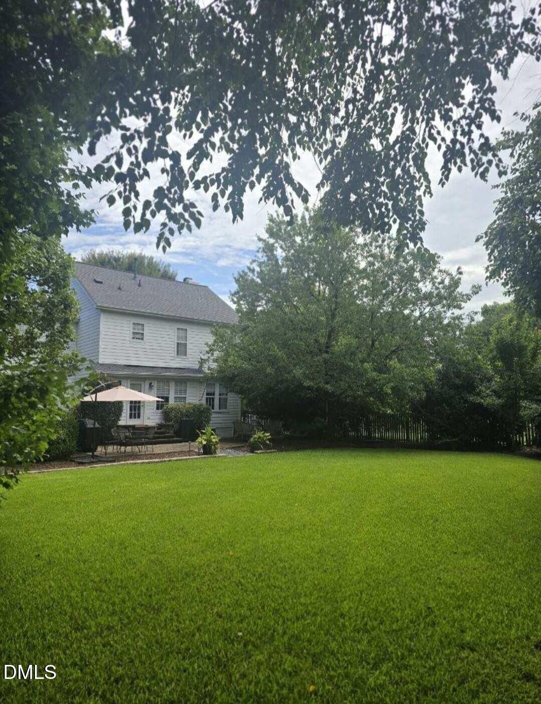 205 Weathervane Way Holly Springs, NC 27540 - Photo 20 of 25 a view of a house with a yard porch and sitting area
