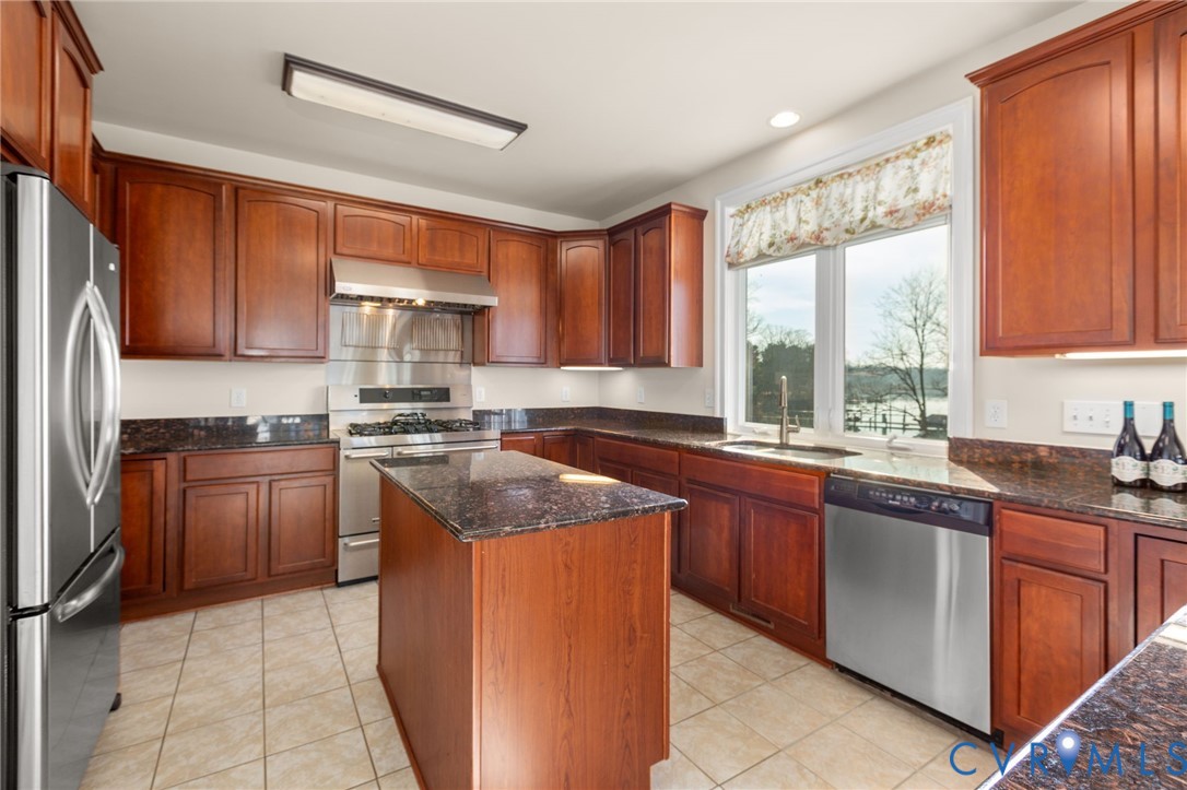 175 Shellfield Lane Colonial Beach, VA 22443 - Photo 20 of 100 Kitchen featuring dark stone countertops, stainles