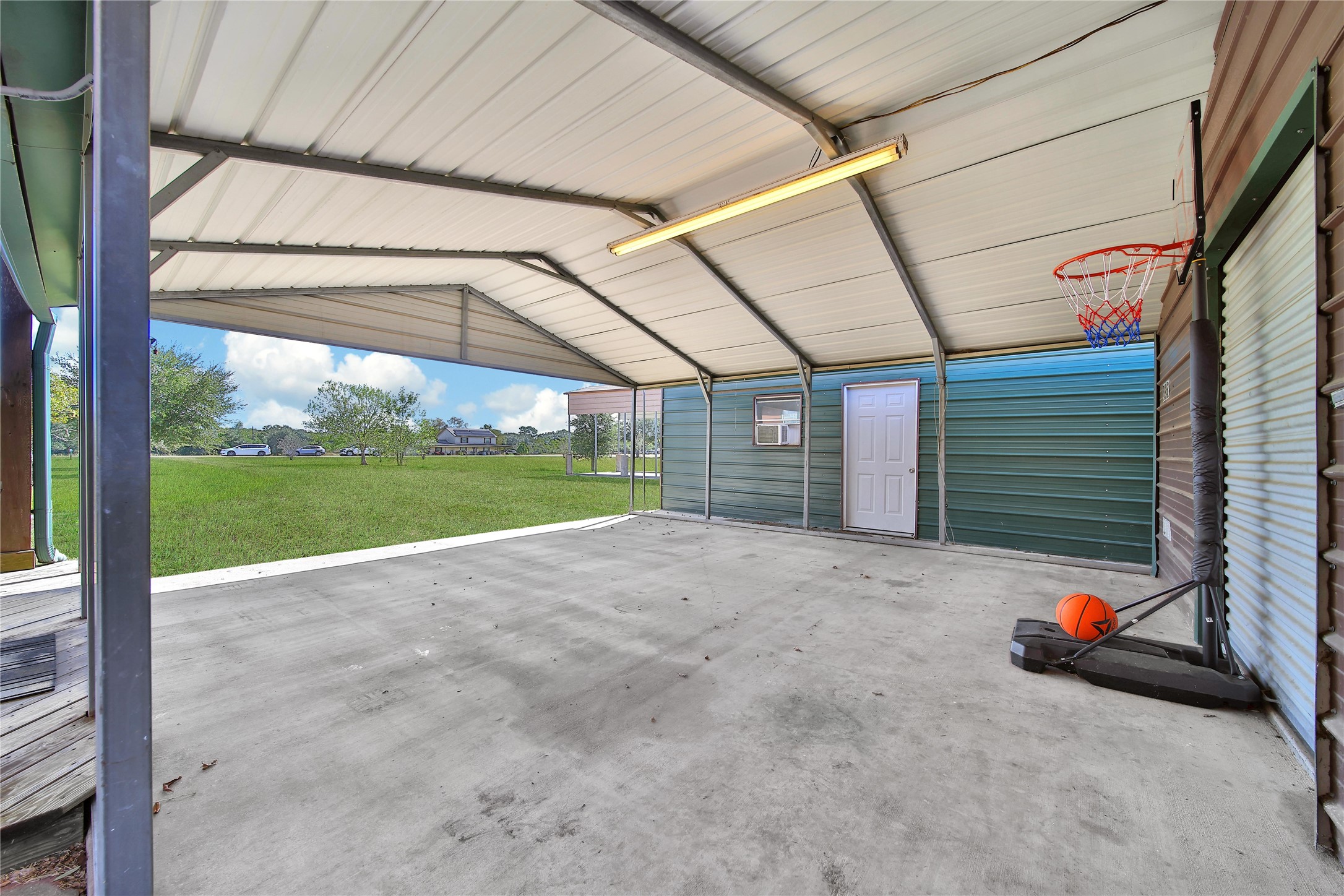 6151 West Creek Road East Bernard, TX 77435 - Photo 12 of 48 a view of a backyard of a house