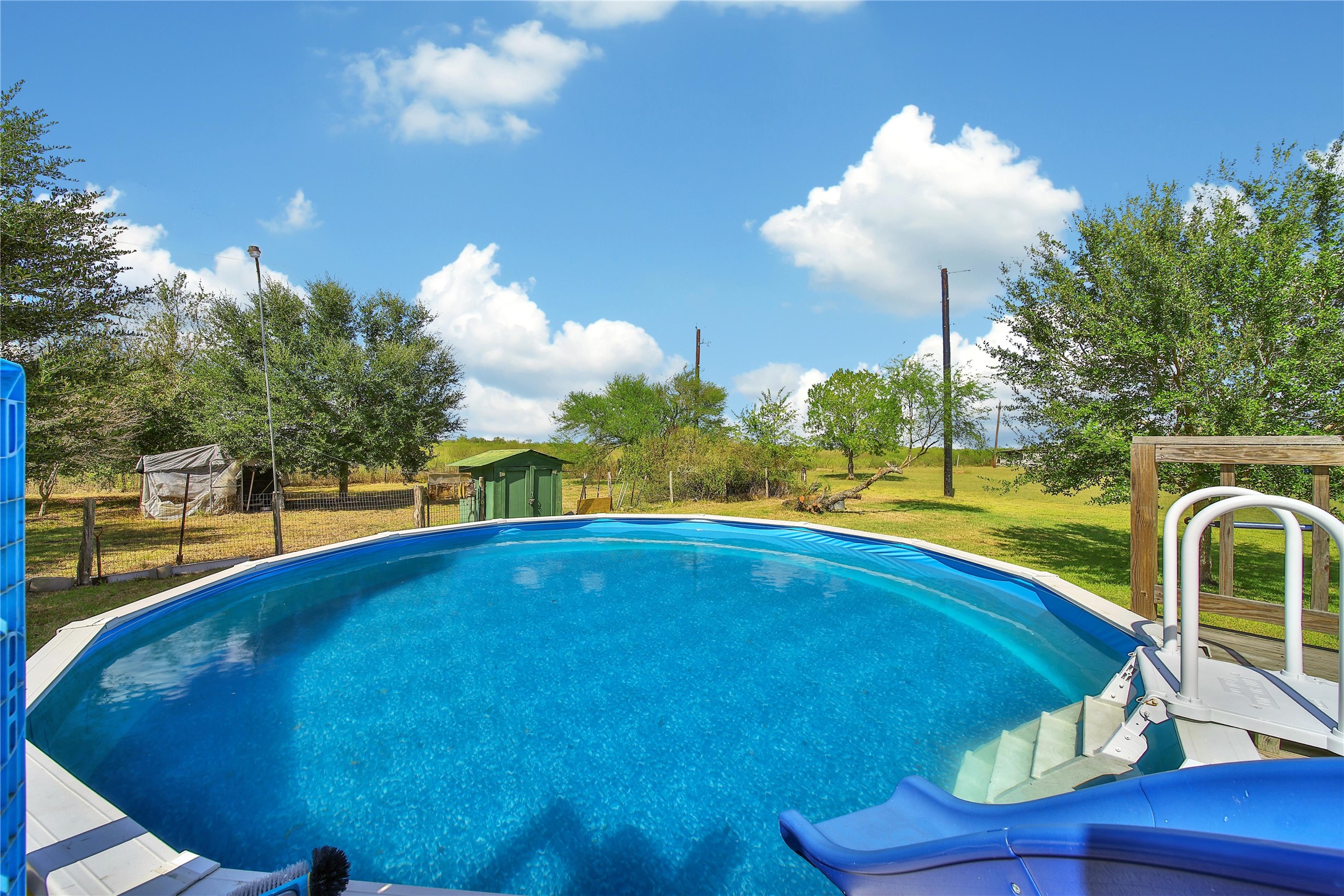 6151 West Creek Road East Bernard, TX 77435 - Photo 14 of 48 a view of swimming pool with seating area
