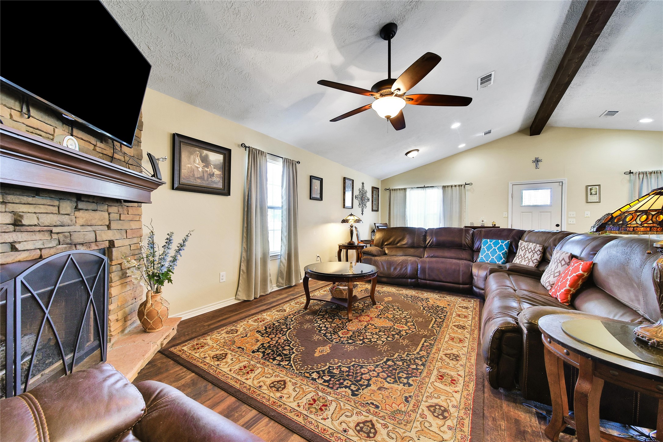 6151 West Creek Road East Bernard, TX 77435 - Photo 23 of 48 a living room with furniture ceiling fan and a rug