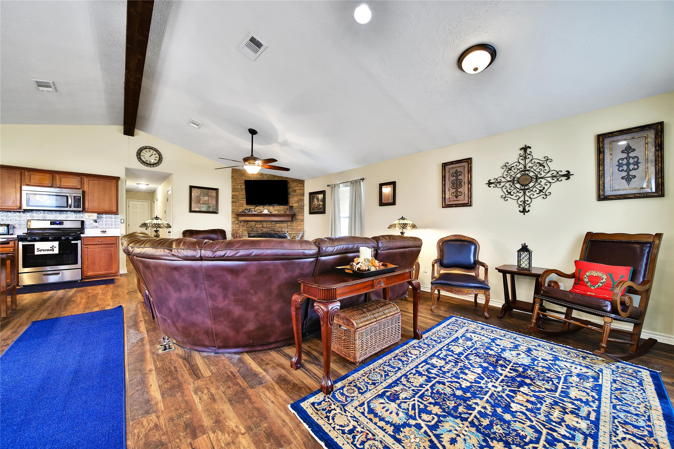 6151 West Creek Road East Bernard, TX 77435 - Photo 25 of 48 a living room with furniture and a flat screen tv