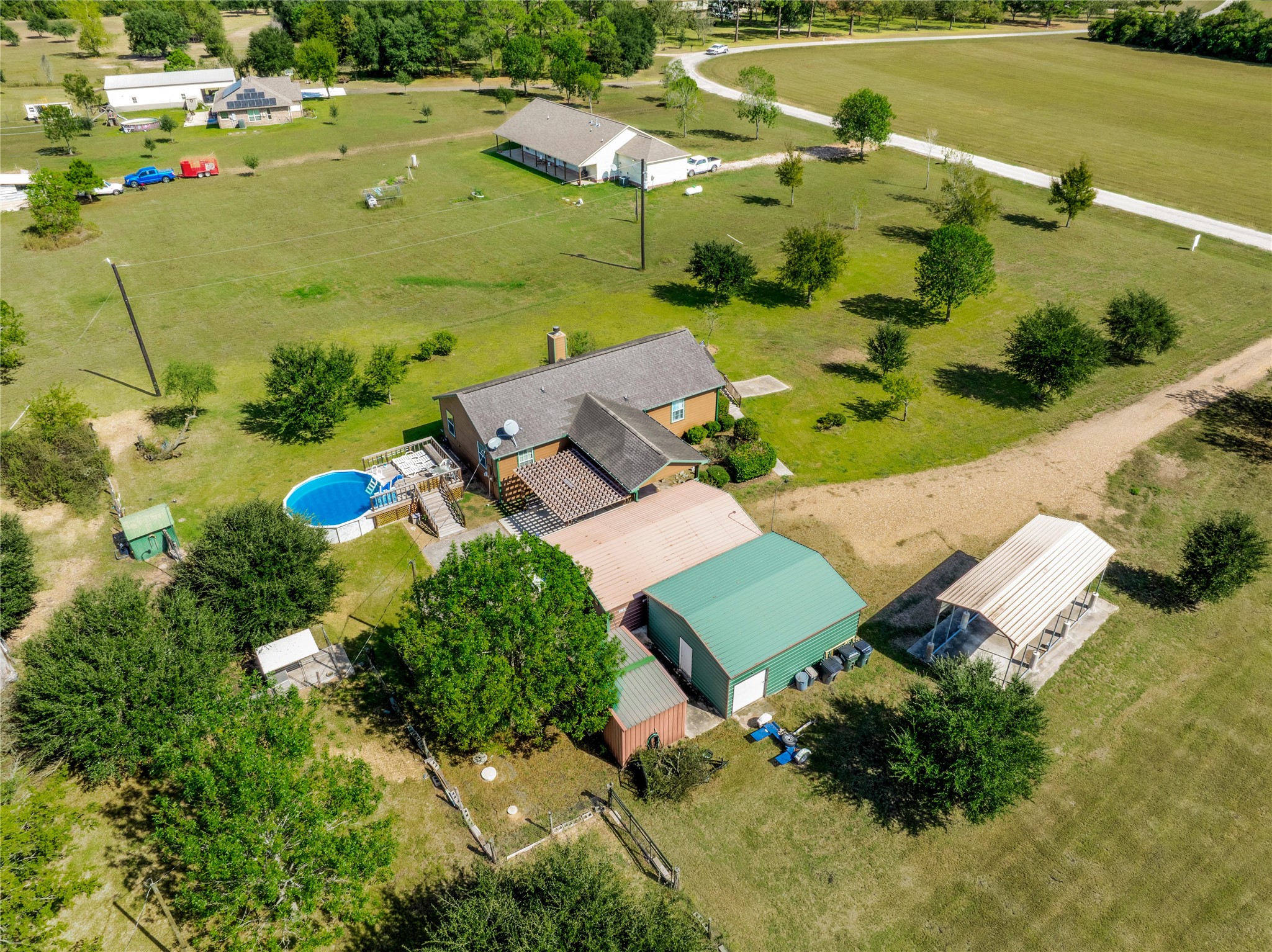 6151 West Creek Road East Bernard, TX 77435 - Photo 37 of 48 an aerial view of a house with a garden