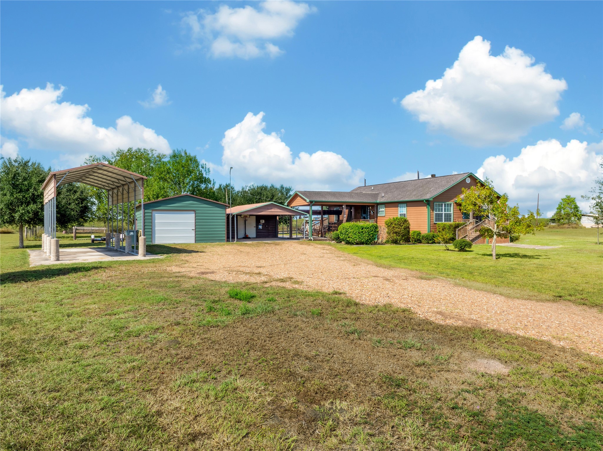 6151 West Creek Road East Bernard, TX 77435 - Photo 46 of 48 a view of a house with a yard
