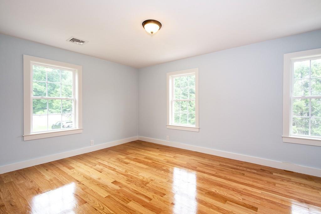 128 Washington Street, Unit R Hanover, MA 02339 - Photo 17 of 29 a view of an empty room with a window