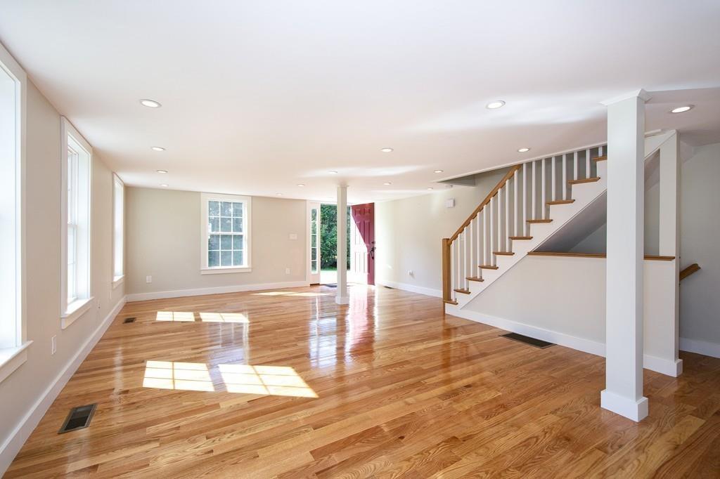 128 Washington Street, Unit R Hanover, MA 02339 - Photo 2 of 29 a view of entryway and hall with wooden floor