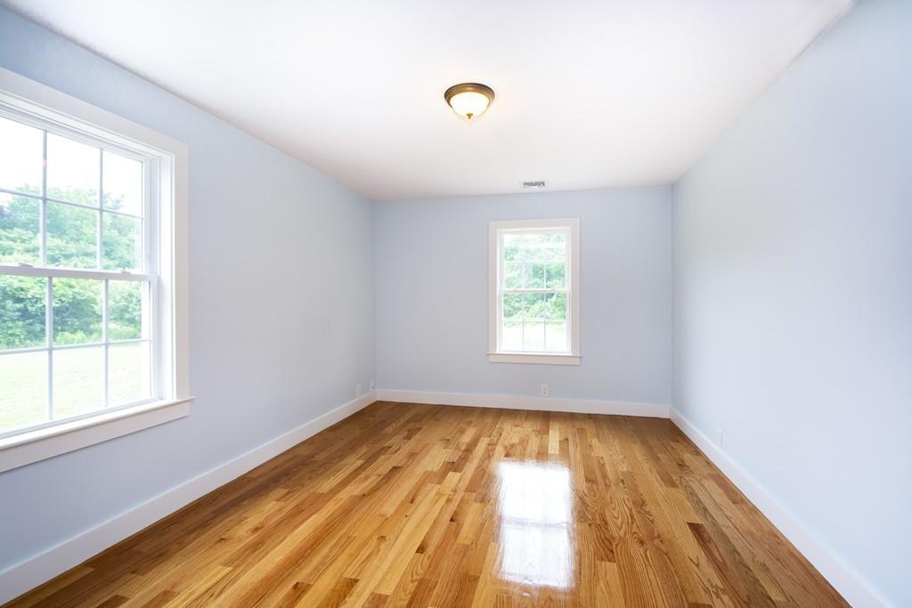 128 Washington Street, Unit R Hanover, MA 02339 - Photo 22 of 29 an empty room with a window