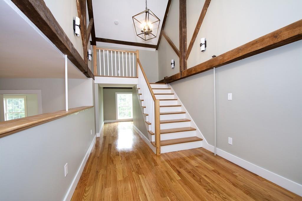 128 Washington Street, Unit R Hanover, MA 02339 - Photo 25 of 29 a view of entryway and hall with wooden floor
