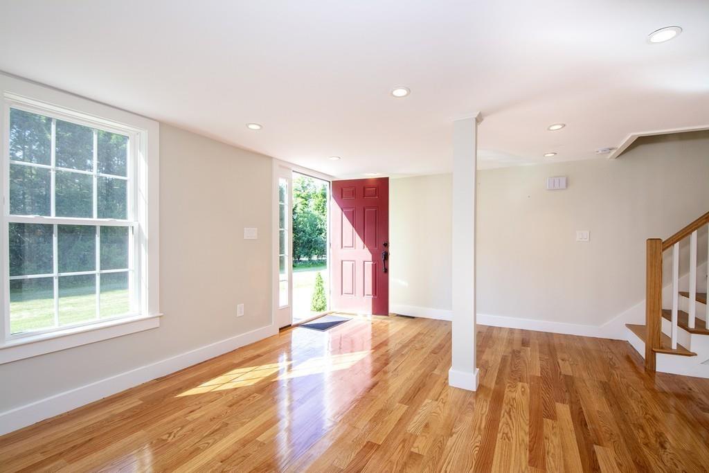 128 Washington Street, Unit R Hanover, MA 02339 - Photo 3 of 29 a view of livingroom with hardwood
