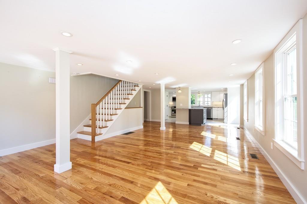 128 Washington Street, Unit R Hanover, MA 02339 - Photo 4 of 29 a view of entryway and hall with wooden floor