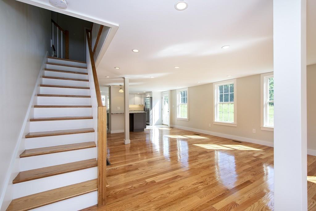 128 Washington Street, Unit R Hanover, MA 02339 - Photo 5 of 29 a view of entryway with wooden floor and front door