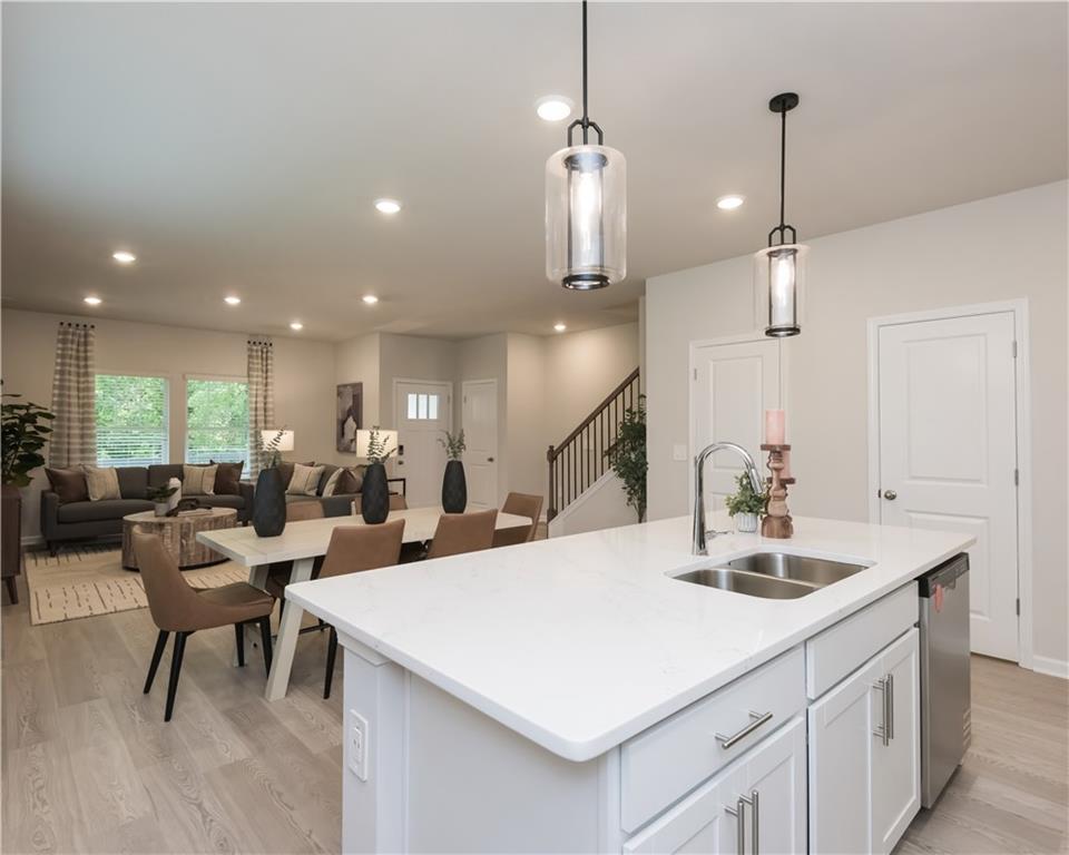 2246 Ashton Drive Conyers, GA 30013 - Photo 6 of 18 a view of a kitchen and dining room