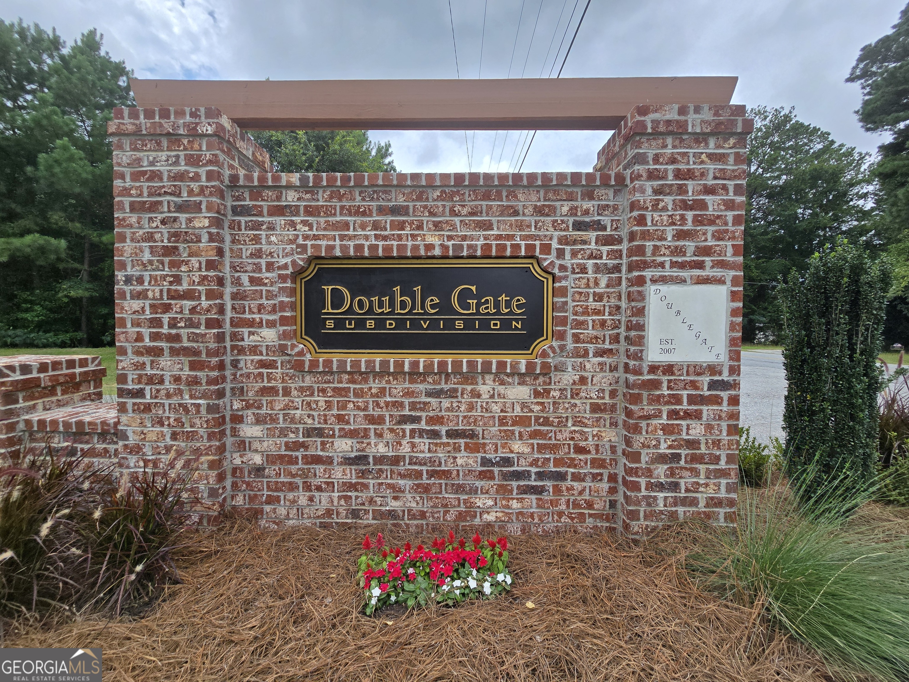 169 Doublegate Drive Lizella, GA 31052 - Photo 2 of 8 a brick building with a street