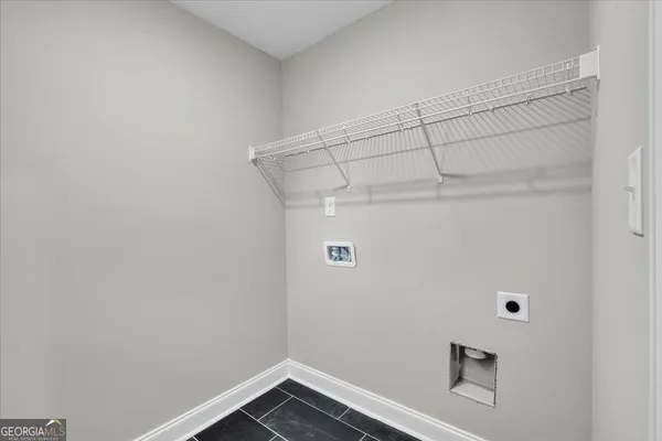 a bathroom with a tub and a shower