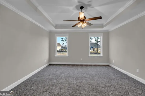 a bathroom with a mirror and a shower