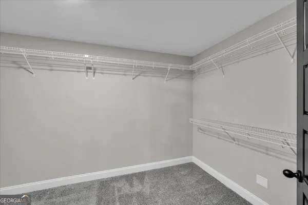wooden floor and closet in a room