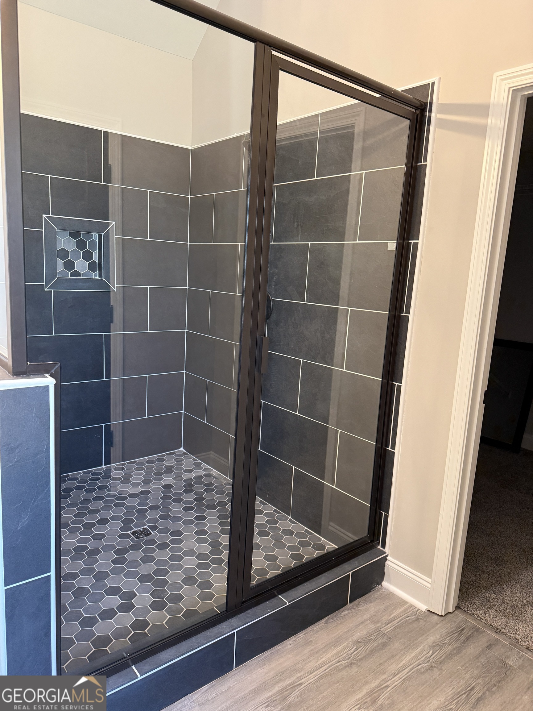 169 Doublegate Drive Lizella, GA 31052 - Photo 3 of 8 a bathroom with a glass door shower