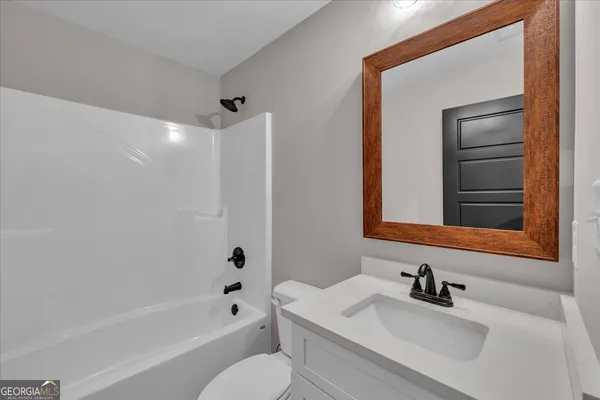 a view of a swimming pool with an ocean view