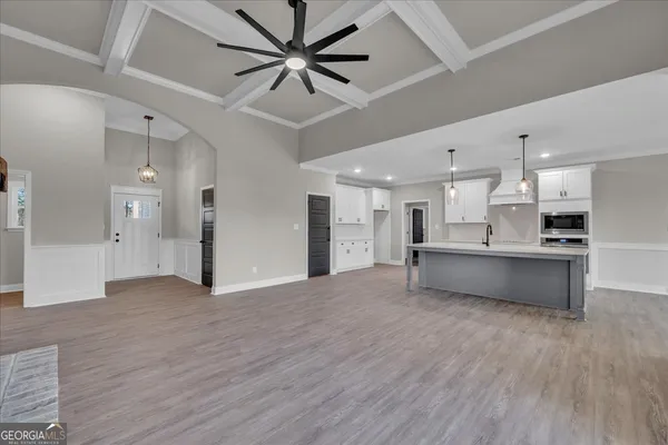 a view of empty room with windows