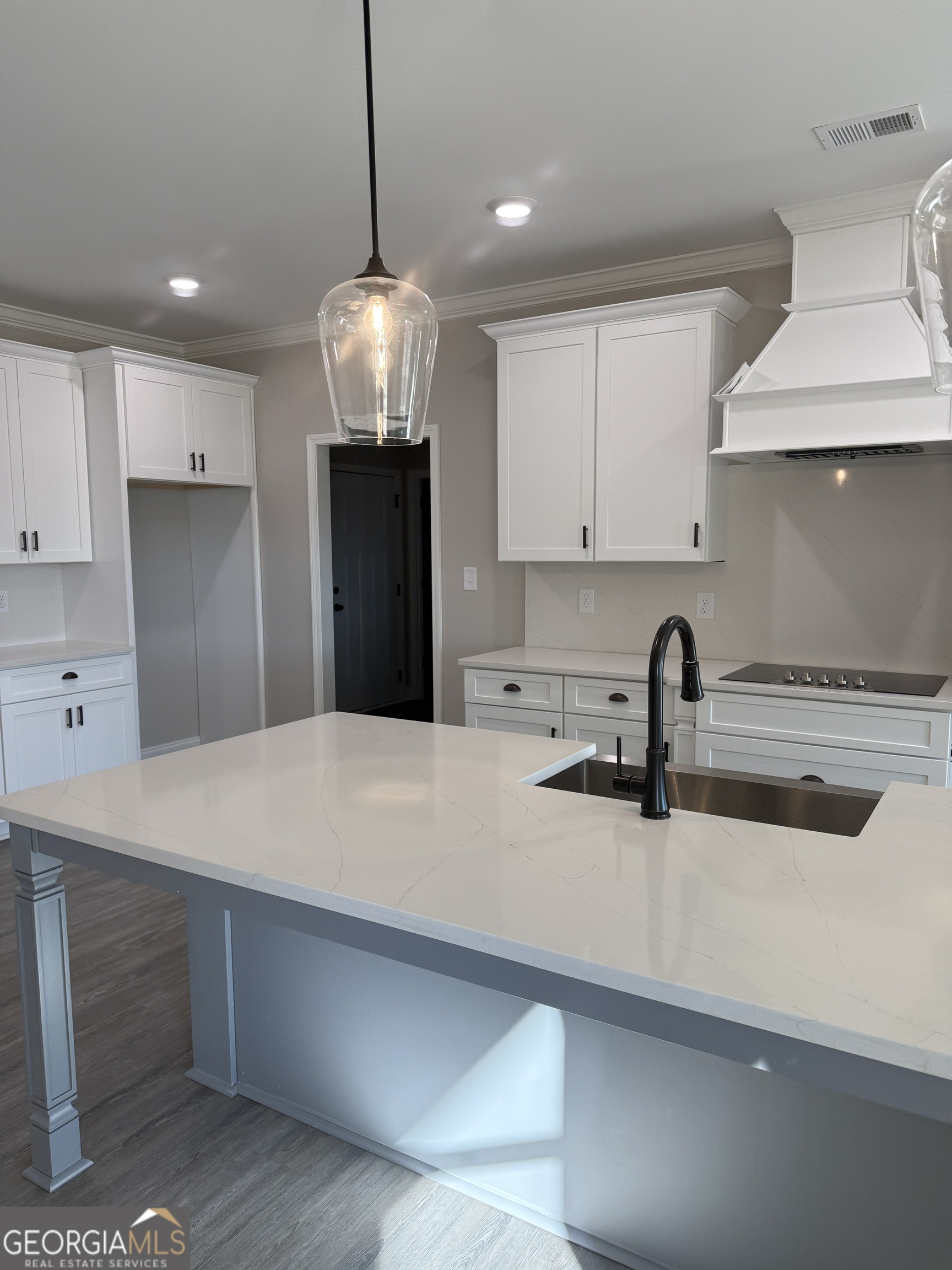 169 Doublegate Drive Lizella, GA 31052 - Photo 7 of 8 a kitchen with refrigerator and stove