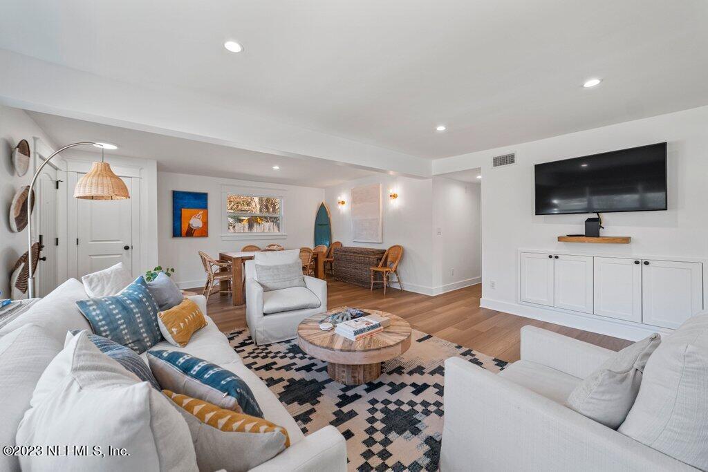 469 Skate Road Atlantic Beach, FL 32233 - Photo 11 of 40 a living room with furniture and a flat screen tv