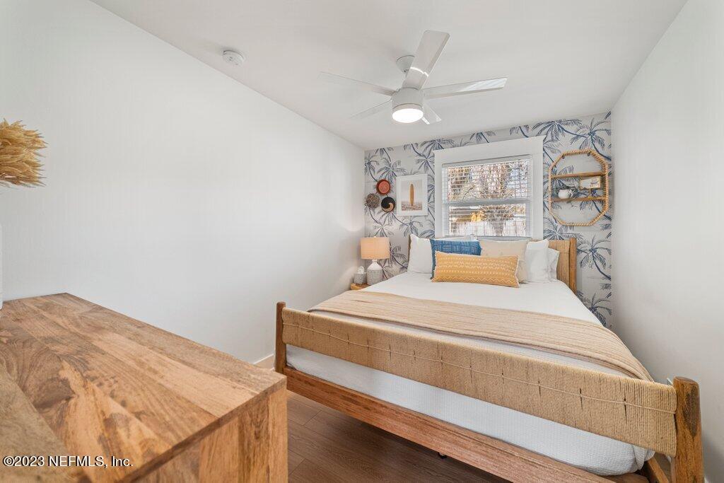 469 Skate Road Atlantic Beach, FL 32233 - Photo 25 of 40 a bedroom with a bed and a window