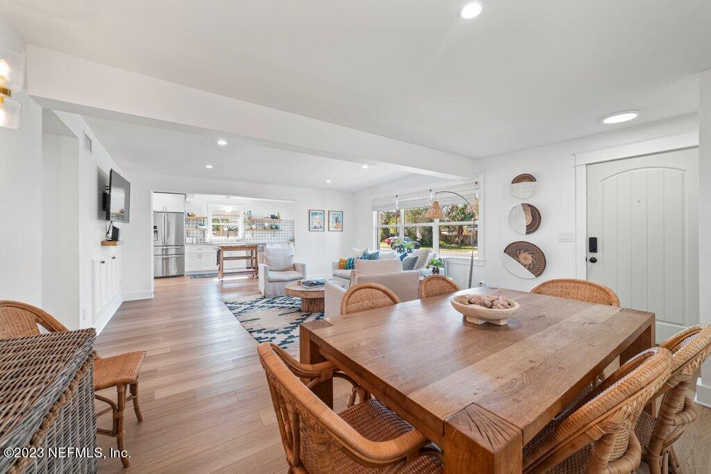 469 Skate Road Atlantic Beach, FL 32233 - Photo 5 of 40 a view of a dining room with furniture and wooden floor