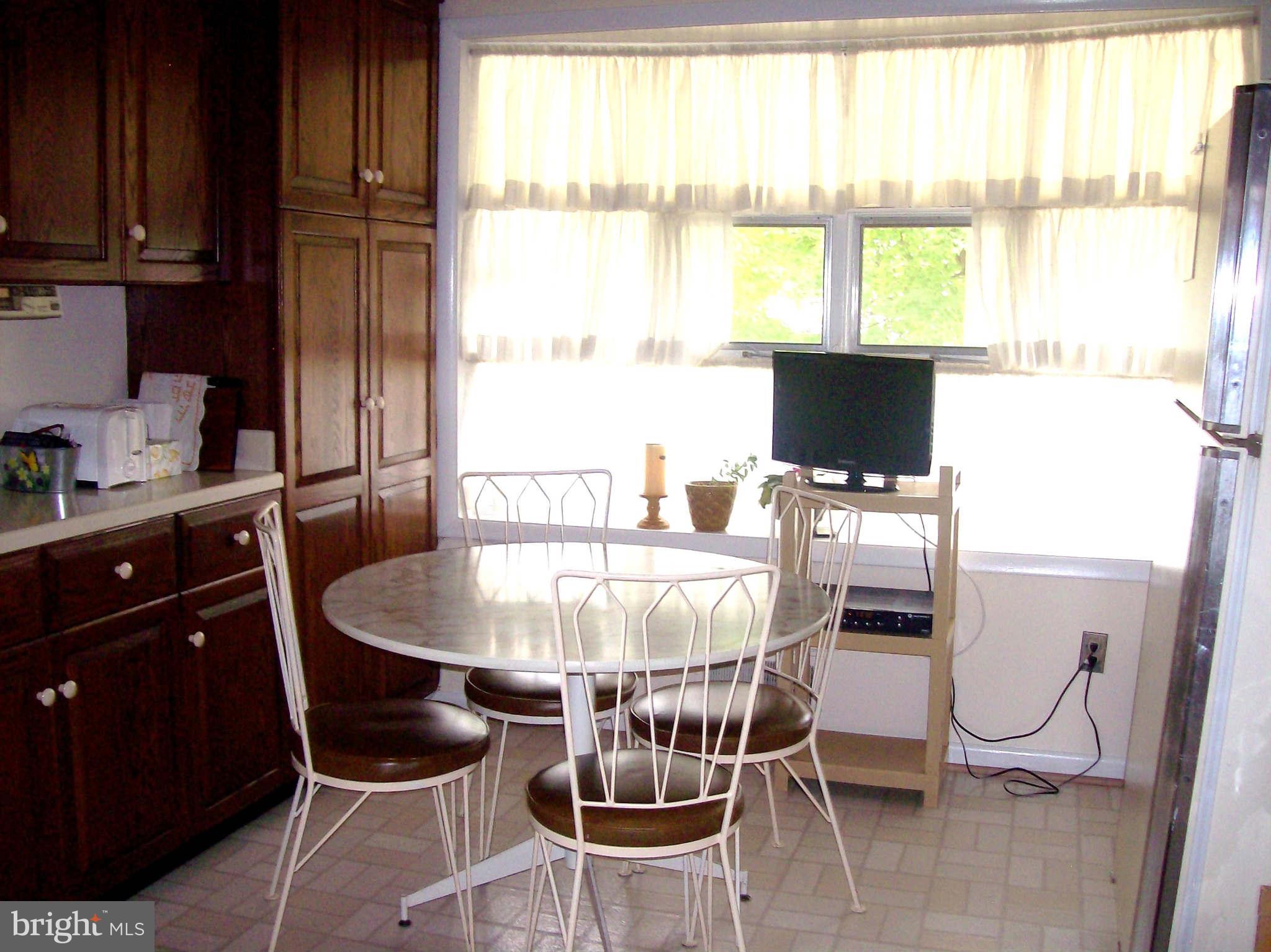 1010 Robroy Drive Silver Spring, MD 20903 - Photo 15 of 30 Eat-in kitchen has a bay window