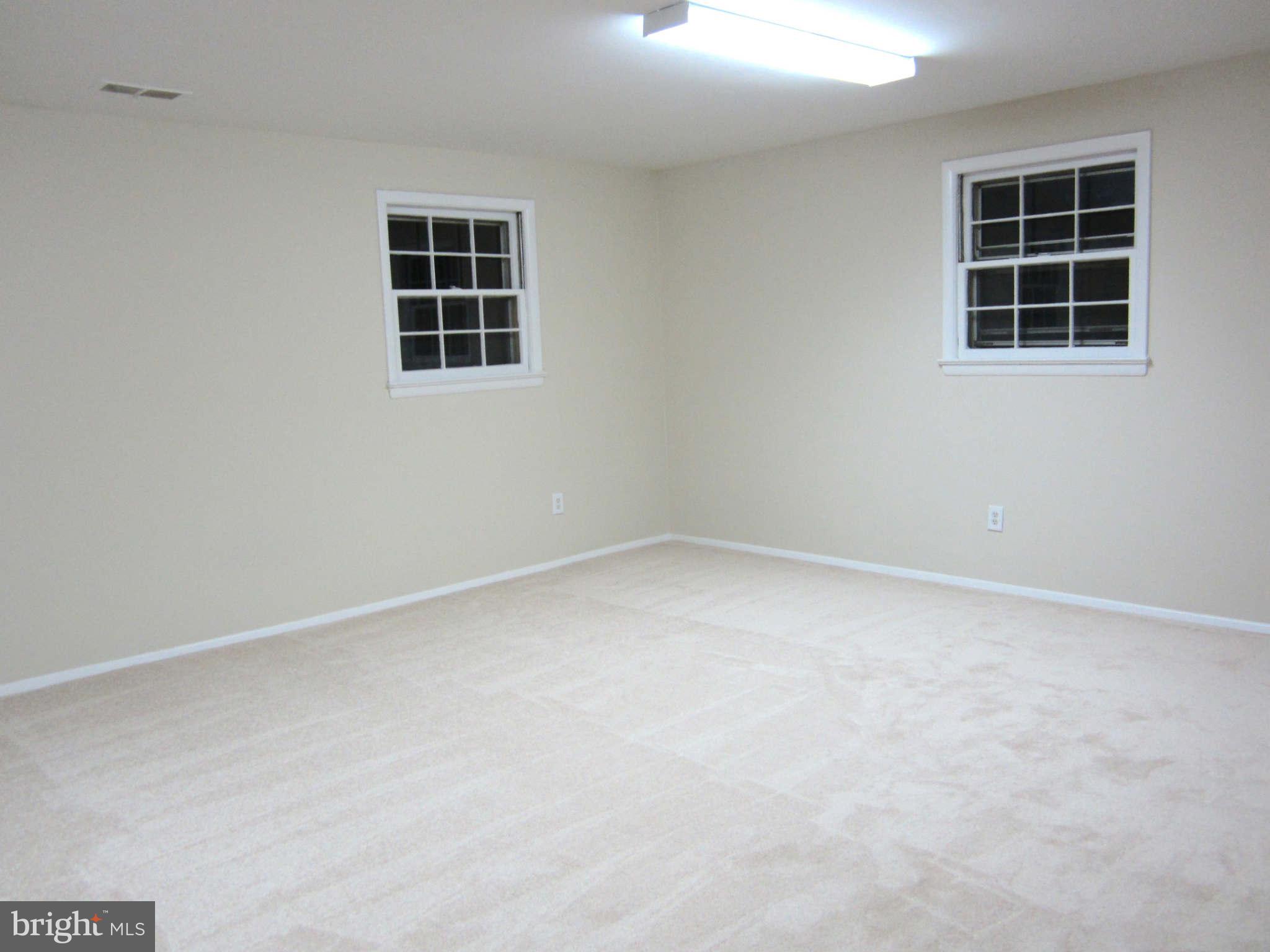 1010 Robroy Drive Silver Spring, MD 20903 - Photo 27 of 30 New carpets in family room & lower level bedroom