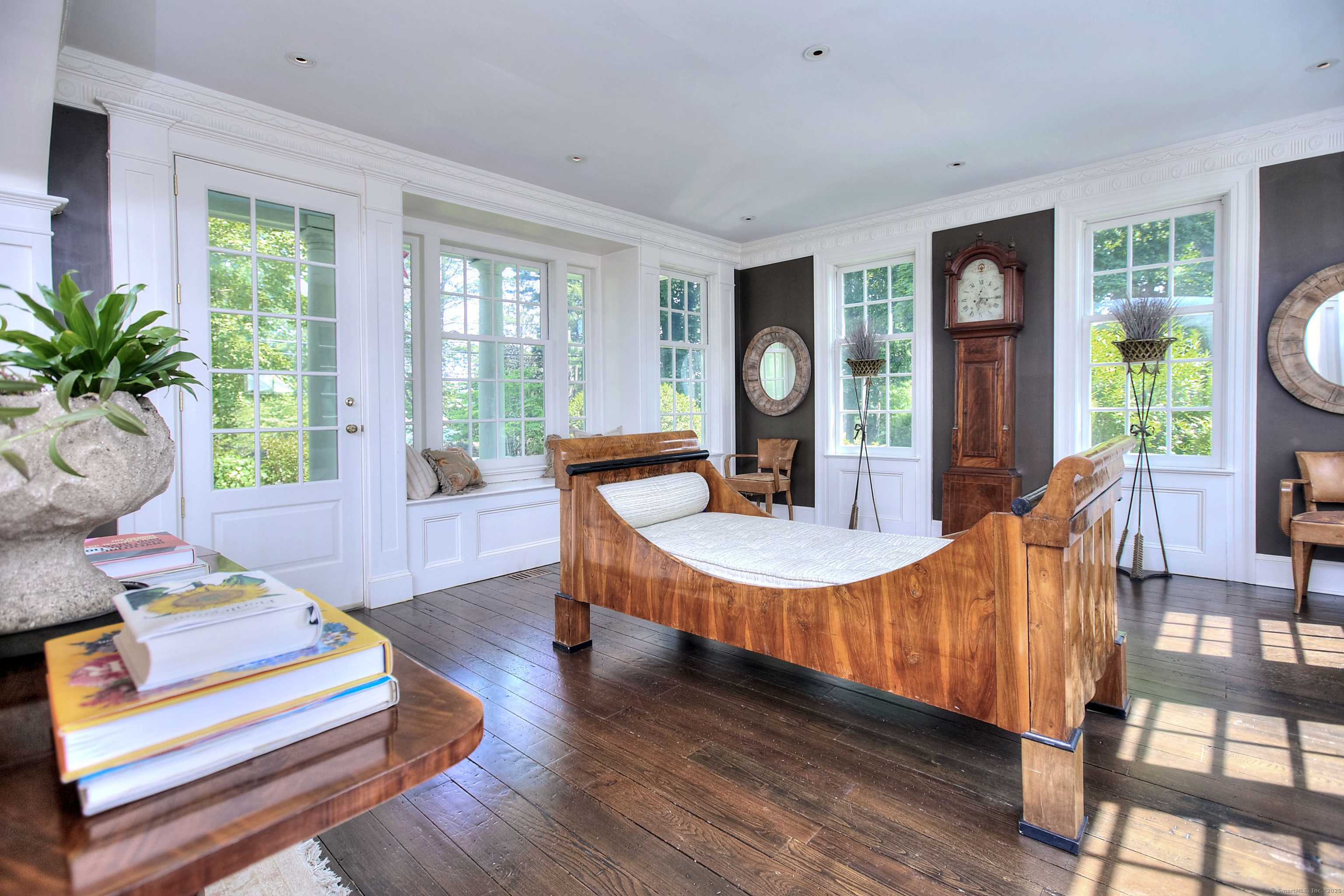 2683 Bronson Road Fairfield, CT 06824 - Photo 14 of 39 a living room with furniture and wooden floor