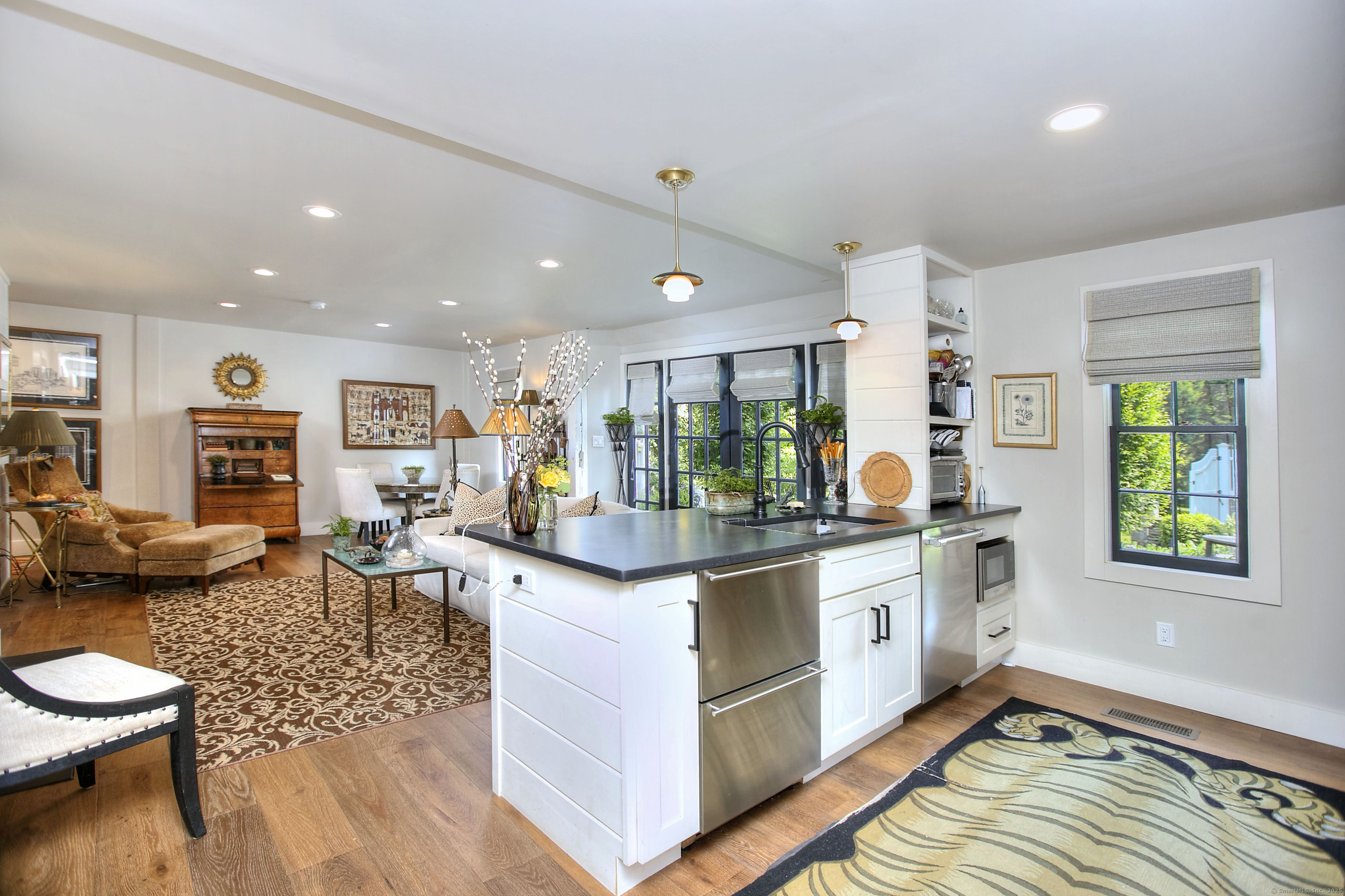 2683 Bronson Road Fairfield, CT 06824 - Photo 34 of 39 a living room with furniture and a large window