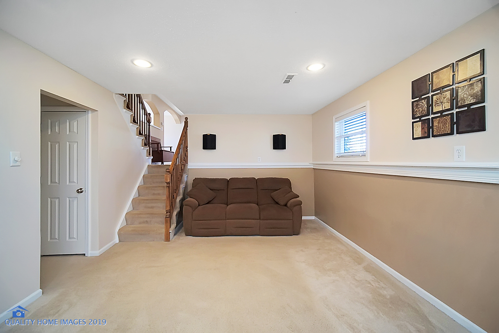 551 Spruce Road Bolingbrook, IL 60440 - Photo 11 of 22 a living room with hard wood floors and a ceiling fan