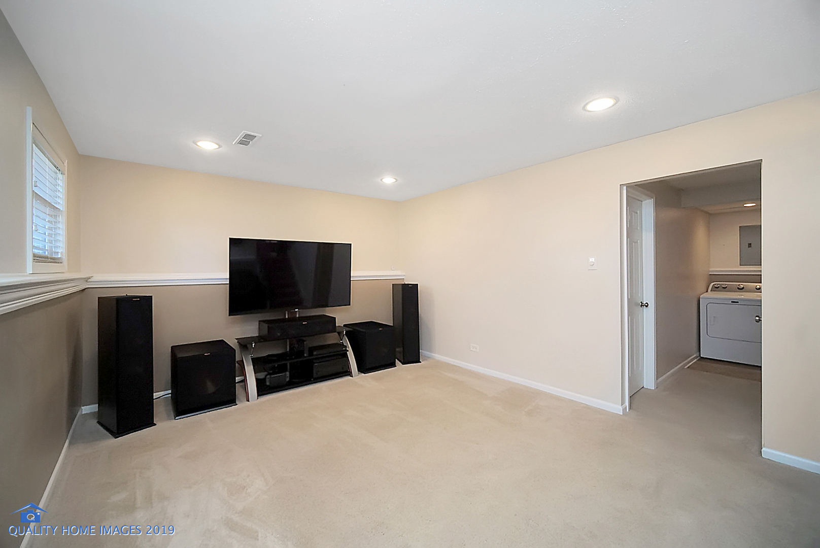 551 Spruce Road Bolingbrook, IL 60440 - Photo 12 of 22 a bedroom with a bed and a flat screen tv