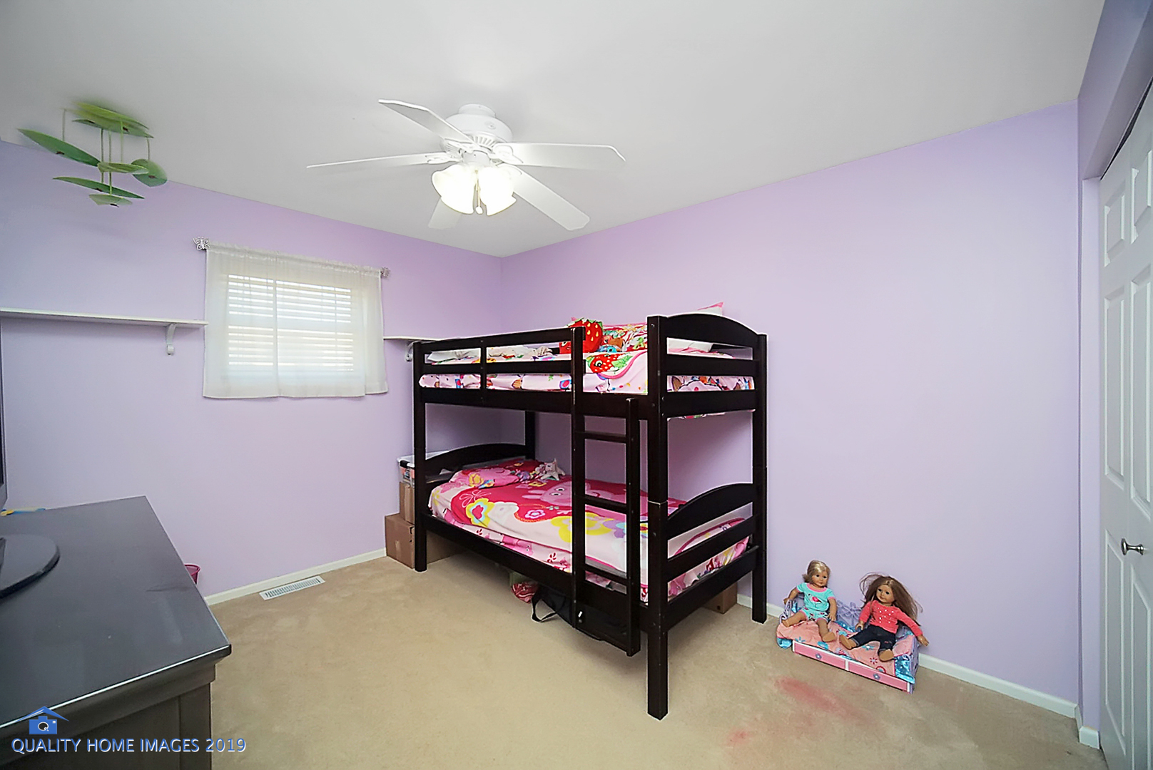 551 Spruce Road Bolingbrook, IL 60440 - Photo 14 of 22 a bedroom with a bed and a chandelier