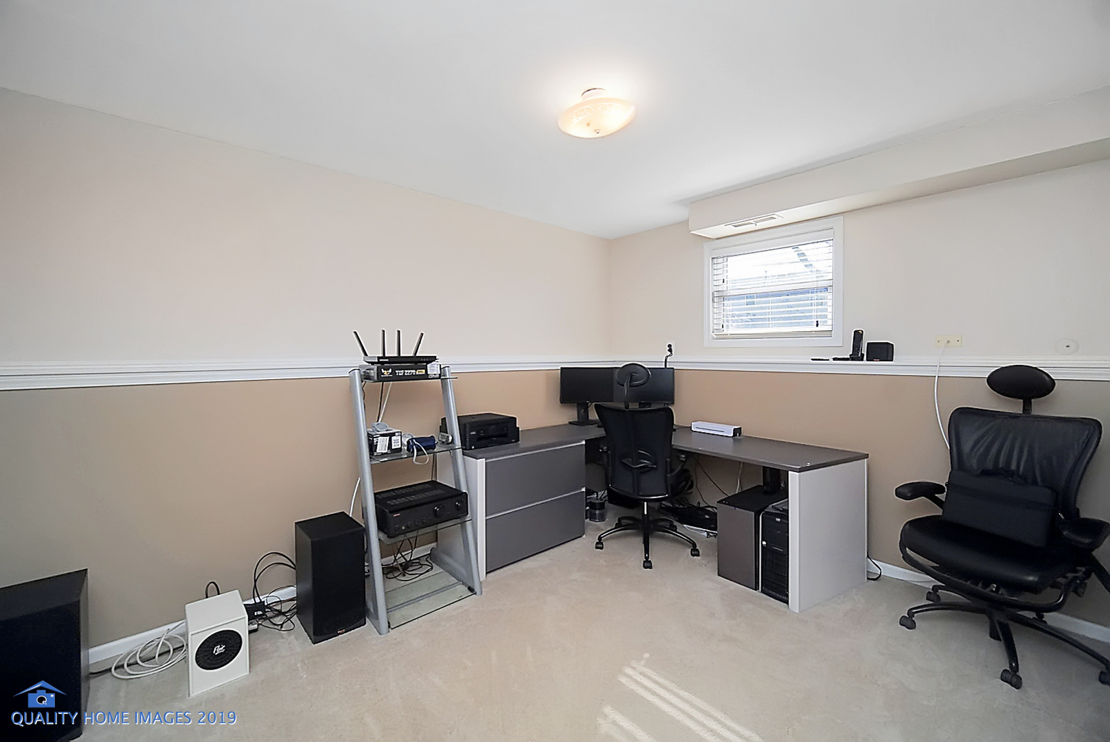 551 Spruce Road Bolingbrook, IL 60440 - Photo 16 of 22 a view of a workspace with furniture and a window