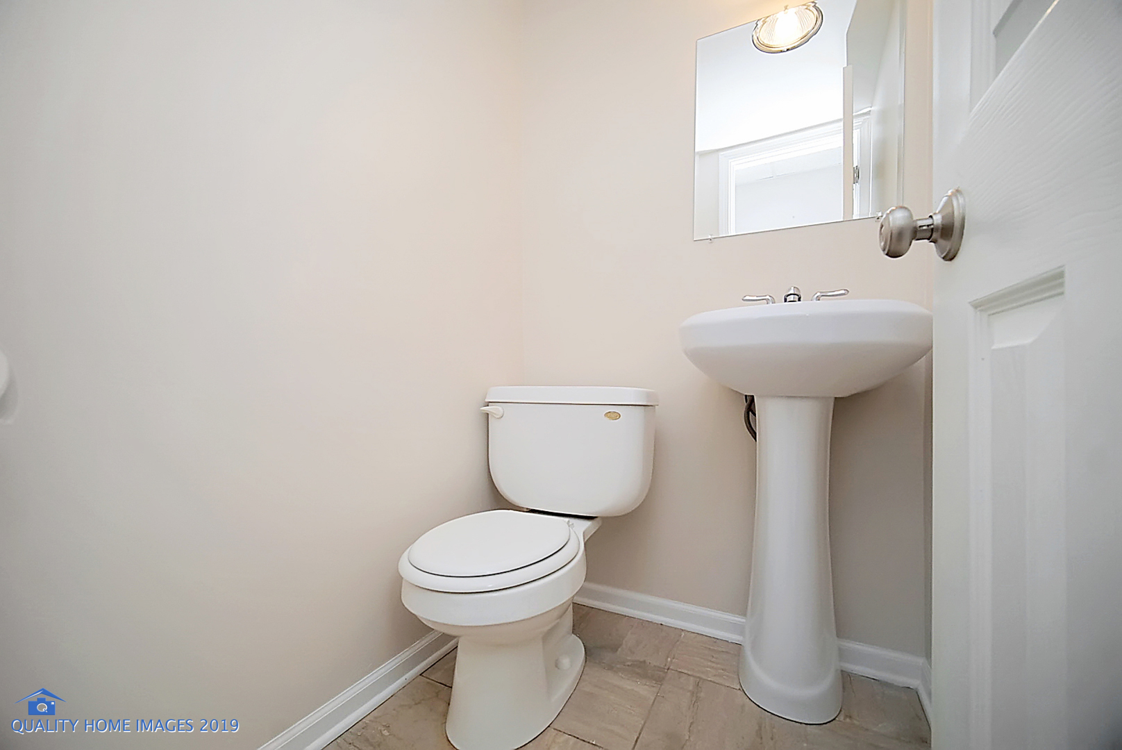 551 Spruce Road Bolingbrook, IL 60440 - Photo 17 of 22 a bathroom with a sink toilet and a mirror