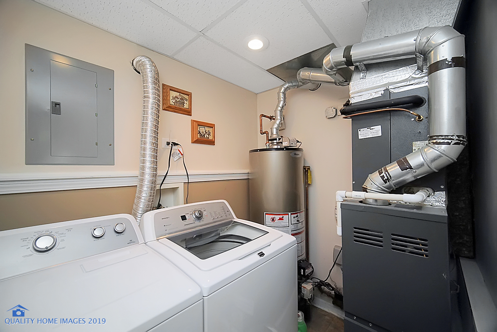551 Spruce Road Bolingbrook, IL 60440 - Photo 18 of 22 a room with storage and utility