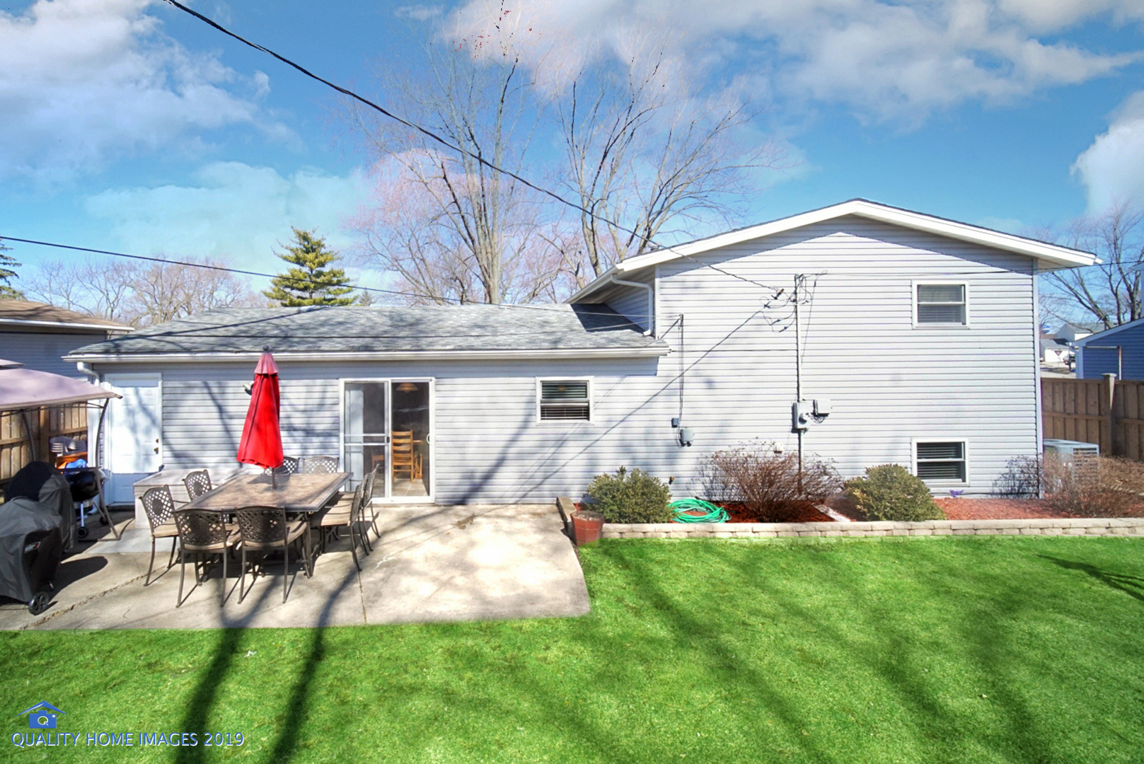 551 Spruce Road Bolingbrook, IL 60440 - Photo 21 of 22 a view of a house with patio