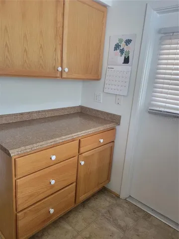 a view of storage and utility room with washer and dryer