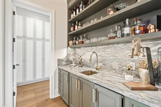 a spacious bedroom with a bed and a window