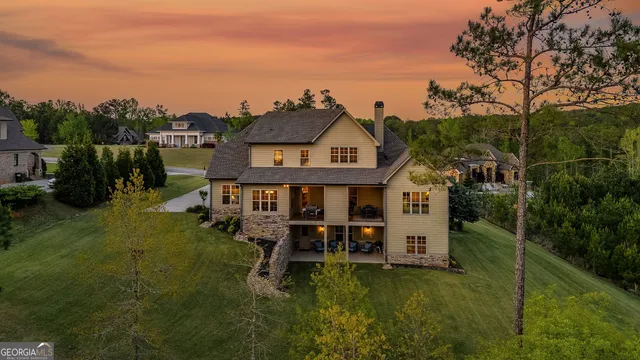 a view of a livingroom with furniture and wooden floor