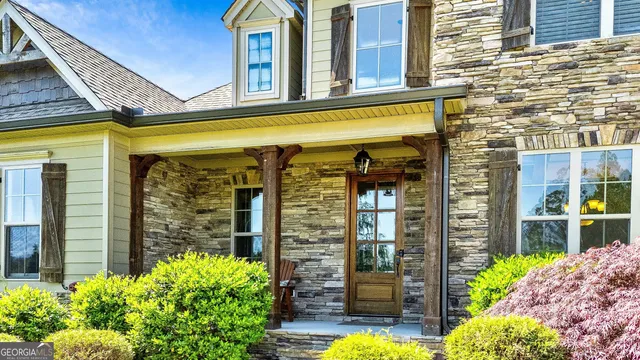 a kitchen with a wooden floor and cabinets